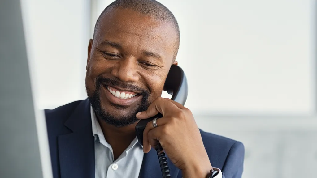 African American man talking on the phone.
